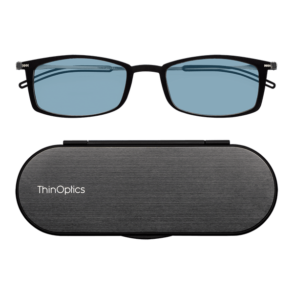 ThinOptics Reading Glasses with Blue Light Blockers and a sleek black case: minimalist design with thin lenses. The compact, brushed metal case offers a modern, portable solution for individuals needing reading glasses.