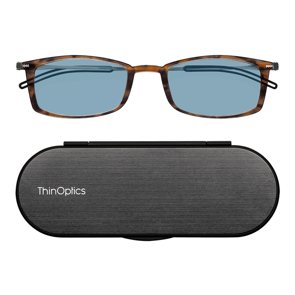 ThinOptics Tortoise Reading Glasses with Blue Light Blockers and a sleek black case: minimalist design with thin lenses. The compact, brushed metal case offers a modern, portable solution for individuals needing reading glasses.