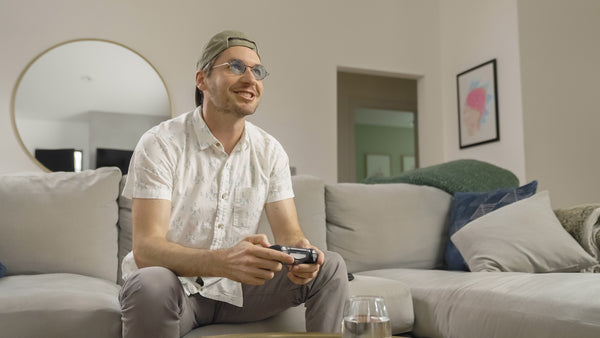 ThinOptics Black framed Reading Glasses with Blue Light Blockers and a sleek black case: minimalist design with thin lenses. The compact, brushed metal case offers a modern, portable solution for individuals needing reading glasses.