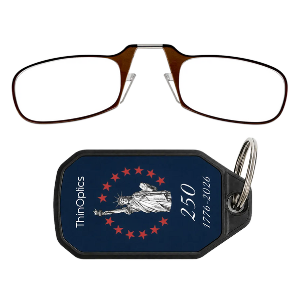 brown readers with navy Lady Liberty Commemorative keychain case