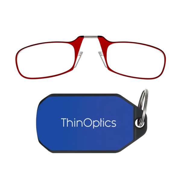 ThinOptics red armless reading glasses above a royal blue keychain case on a white background
