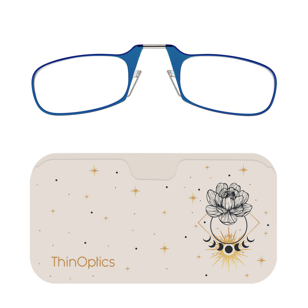 Blue ThinOptics reading glasses rest unfolded on their celestial-themed carrying case.