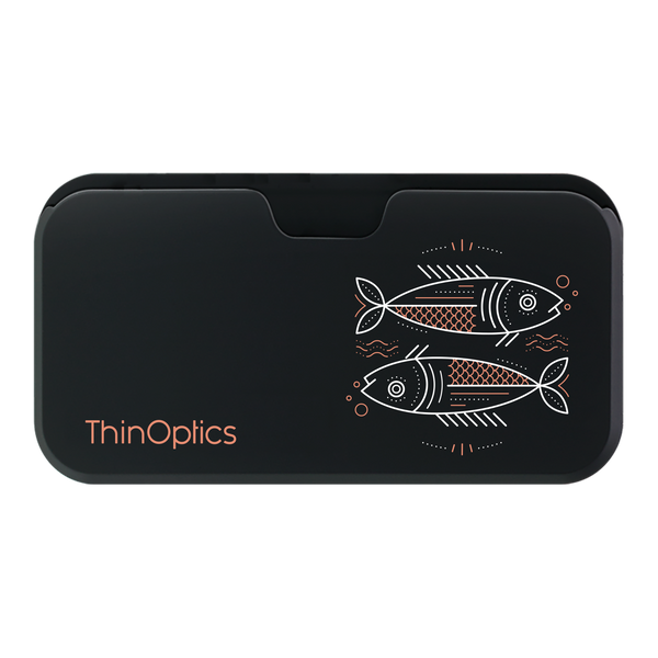 ThinOptics black reading glasses case displays a minimalist copper and white design of two fish swimming.