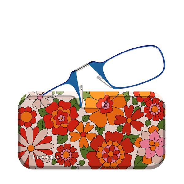 Blue ThinOptics reading glasses rest unfolded on their floral patterned case.