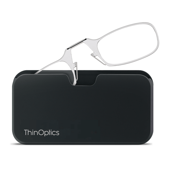 ThinOptics reading glasses rest unfolded atop their slim, black case.
