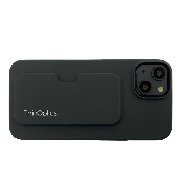 Black phone case with integrated ThinOptics reading glasses holder, shown from the back.