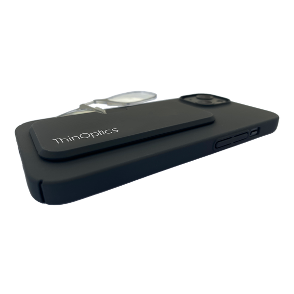 A black ThinOptics phone case holds a pair of ThinOptics reading glasses securely on the back.