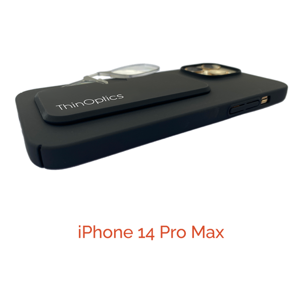 A black iPhone 14 Pro Max displays a ThinOptics reading glasses case magnetically attached to the back.
