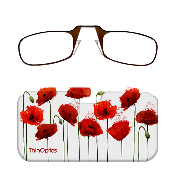 Brown ThinOptics reading glasses rest on a white case featuring a delicate design of red poppies.