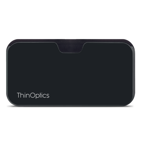 A sleek, black ThinOptics reading glasses case rests on a surface.