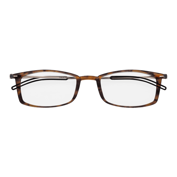 Tortoiseshell reading glasses with thin, rectangular frames rest on a blue background.