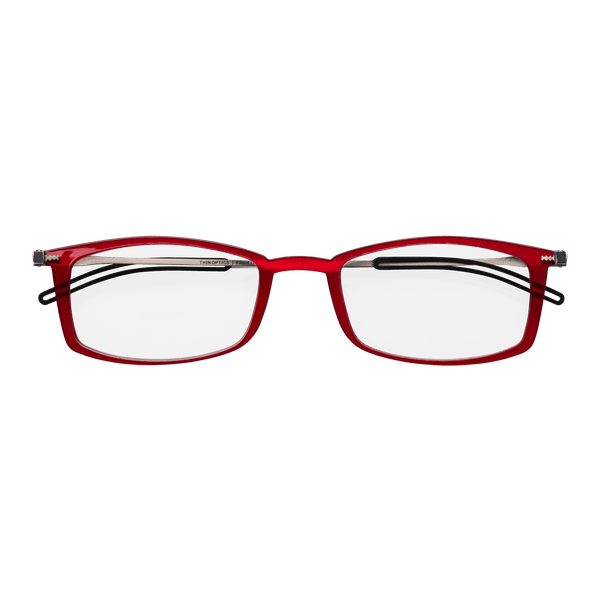 Red reading glasses with thin silver temples sit on a blue background.