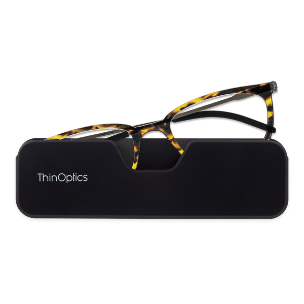 ThinOptics Tortoise Frame Connect Reading Glasses and a sleek black Connect case: minimalist design with thin lenses. The compact, polycarbonate case offers a modern, portable solution for individuals needing reading glasses.