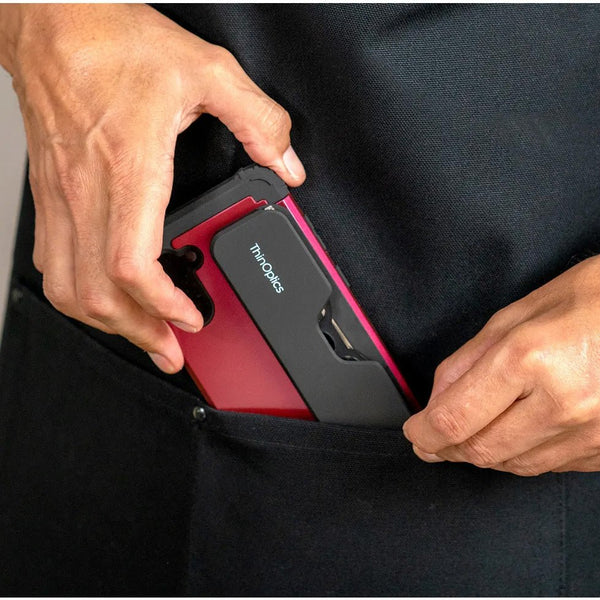 ThinOptics Black Frame Connect Reading Glasses and a sleek black Connect case: minimalist design with thin lenses. The compact, polycarbonate case offers a modern, portable solution for individuals needing reading glasses.