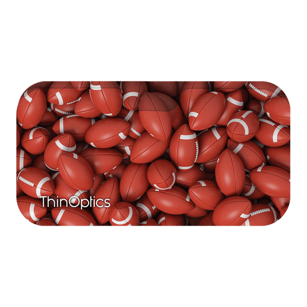 Pile of leather footballs with the ThinOptics logo.