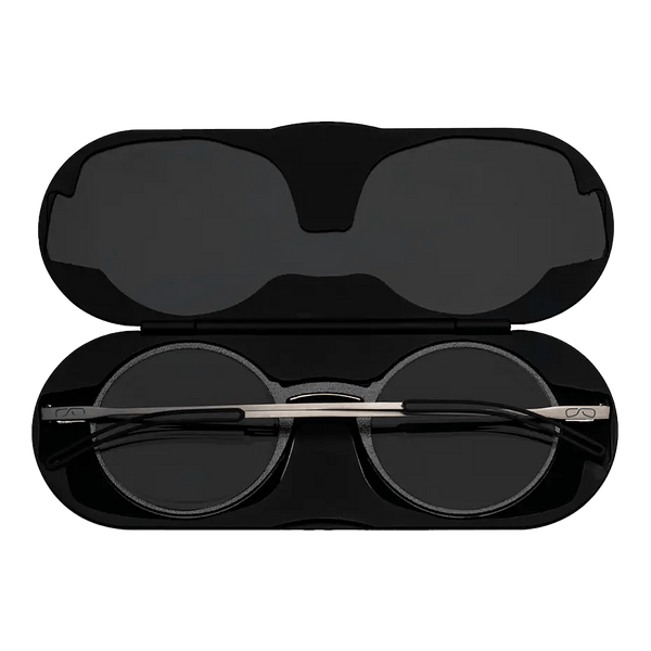 ThinOptics Black framed Reading Glasses with Blue Light Blockers and a sleek black case: minimalist design with thin lenses. The compact, brushed metal case offers a modern, portable solution for individuals needing reading glasses.