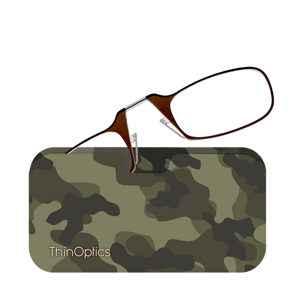Brown ThinOptics reading glasses rest on a camouflage-patterned case.