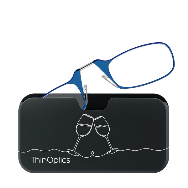 Blue ThinOptics reading glasses rest on a sleek black case featuring a minimalist design of two toasting wine glasses.