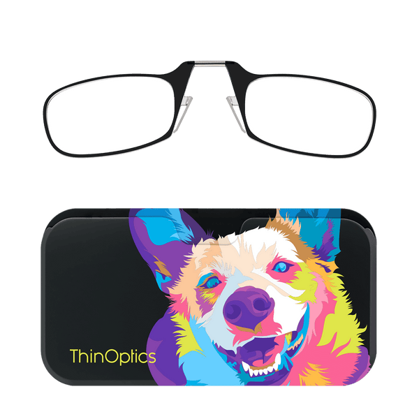 Black ThinOptics reading glasses rest on a colorful case featuring a vibrant, pop-art dog design.