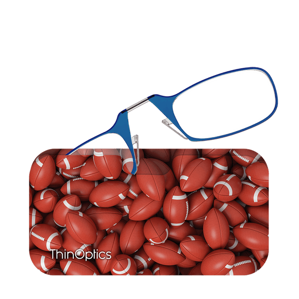 Blue ThinOptics reading glasses rest on a case featuring a jumbled pile of footballs.