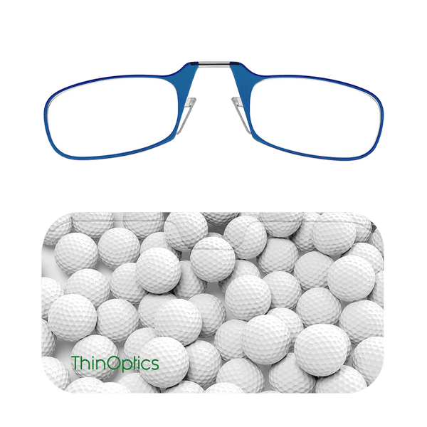 Blue ThinOptics reading glasses folded on top of a case featuring a close-up image of white golf balls.