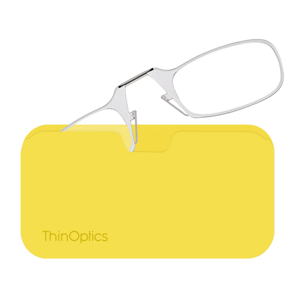 Silver ThinOptics reading glasses rest on their bright yellow carrying case.