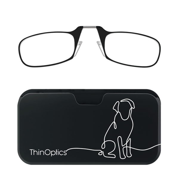 Black ThinOptics reading glasses folded on top of their matching black case featuring a minimalist white line drawing of a dog.