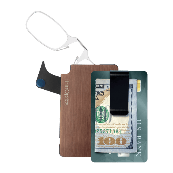 The ThinOptics Clear Readers + Rose Gold Flashcard Wallet is a revolutionary advancement in the consolidation of your essentials, bringing together your credit cards, cash, identification, and reading glasses in a durable and compact case that'll go everywhere with you.
Made from brushed stainless steel with PVD coating for increased impact strength and excellent abrasion resistance, the ThinOptics Readers + Black Flashcard Wallet looks great and securely holds everything you need.