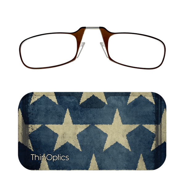 ThinOptics reading glasses with a slim, foldable design rest atop their matching blue and tan star-patterned case.