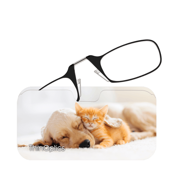 ThinOptics reading glasses rest on a phone displaying a sleeping puppy and kitten.