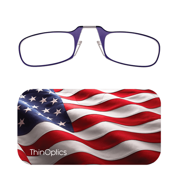 Purple ThinOptics reading glasses rest on a case displaying a waving American flag.