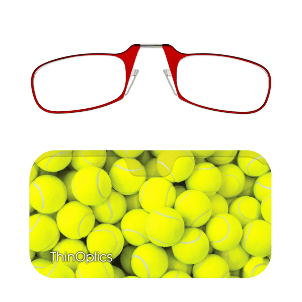 Red ThinOptics reading glasses fold compactly into a slim case featuring a pattern of bright yellow tennis balls.
