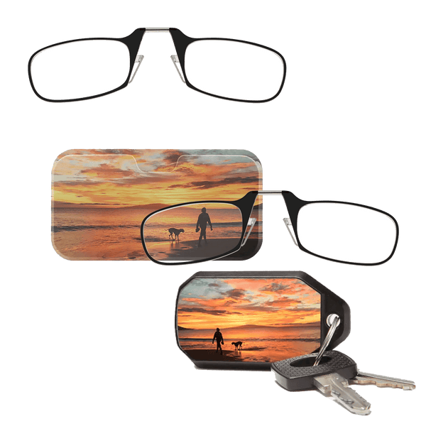 With the ThinOptics Spring Sunset Multi-Pack, you're getting two ingenious solutions with a serene sunset print. One pair of Black Readers fit snugly into a Universal Pod Case which will attach (via an included non-residue adhesive strip) to any hard and flat surface, like the back of your phone or laptop
A second pair of Black Readers live cocooned in the strong Keychain Case and magically emerge with the slide of a finger!