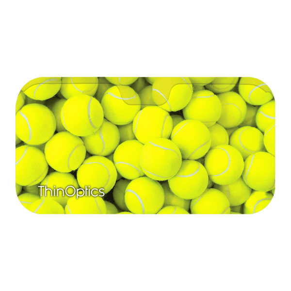 ThinOptics logo on a bed of bright yellow tennis balls.