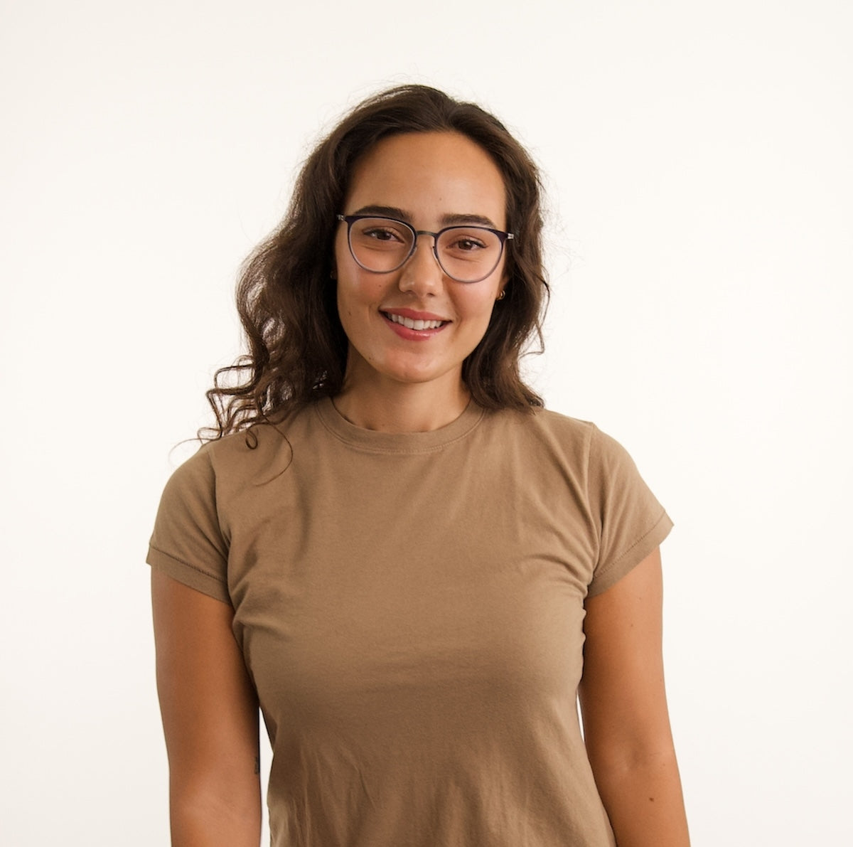 Woman wearing blue Cradle Prescription Glasses.