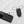 Moment armless readers with black magnetic pod and black keychain case on marble