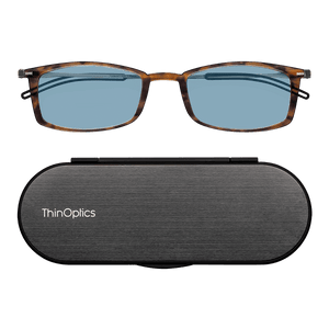 ThinOptics Tortoise Reading Glasses with Blue Light Blockers and a sleek black case: minimalist design with thin lenses. The compact, brushed metal case offers a modern, portable solution for individuals needing reading glasses.