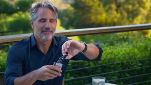 Man removing Readers from the Slimline Wallet Case