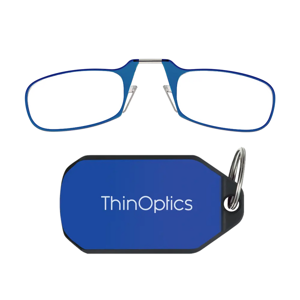 ThinOptics blue armless reading glasses above a royal blue keychain case on a white background