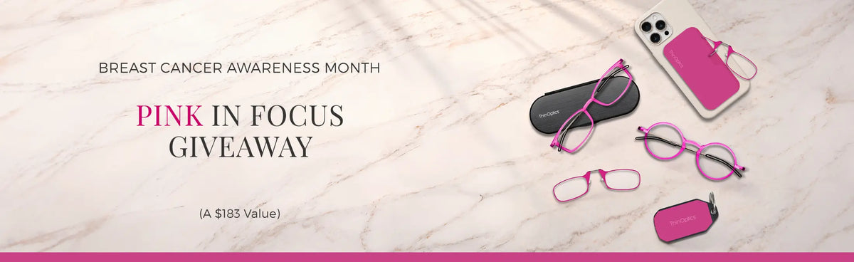 ThinOptics Breast Cancer Awareness Month Giveaway banner featuring pink Brooklyn, Manhattan, and armless readers with pink cases on marble