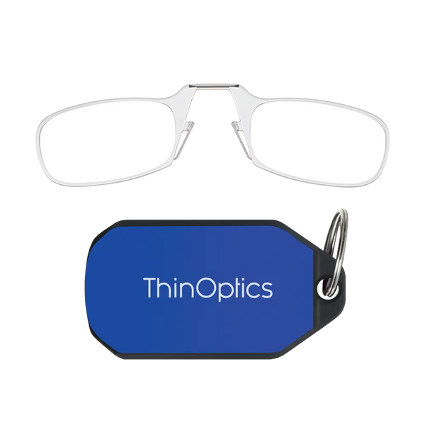 ThinOptics clear armless reading glasses above a royal blue keychain case on a white background