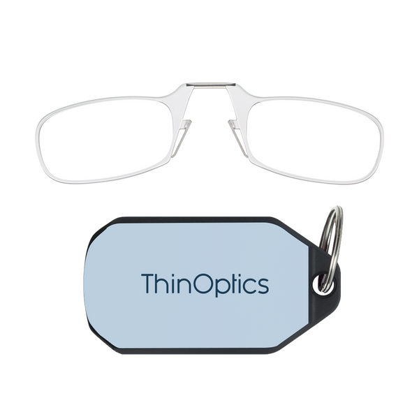 ThinOptics clear armless reading glasses above a soft blue keychain case