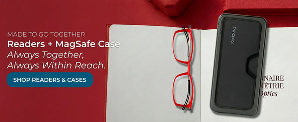 Red ThinOptics reading glasses and slim black carrying case displayed on open book with red background accents